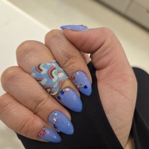 Blue Nail Art with Gem Accents